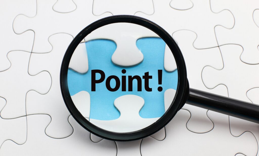 虫眼鏡で「point」の文字を拡大している図